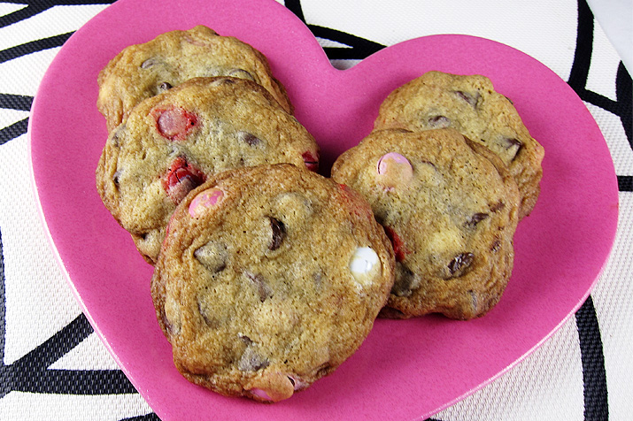 Supreme Chocolate Chip Cookies - these crispy, yet chewy cookies are loaded with chocolate chips and M&Ms. A delicious treat your family will love this Valentine's Day or any day.